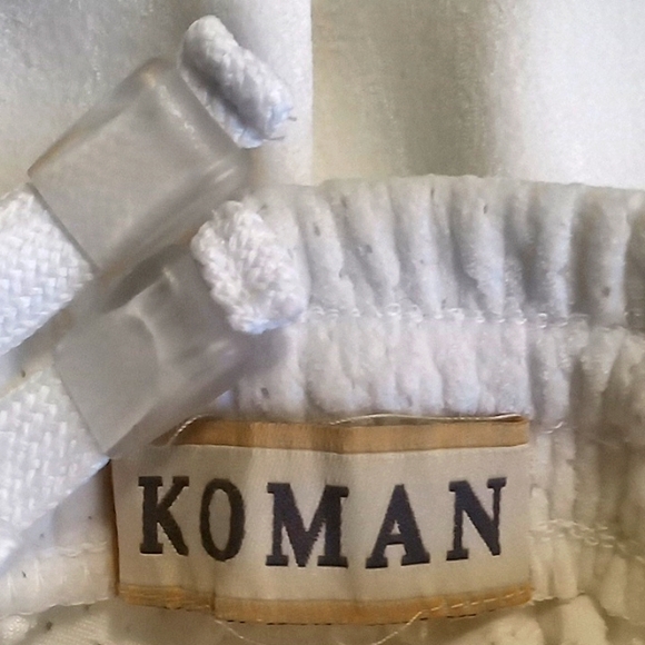 Stunning 2pc White Tracksuit with Embroidered Logo by KOMAN - Picture 16 of 16